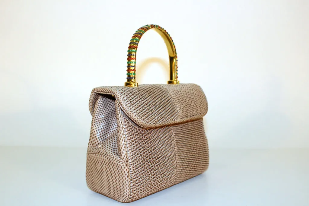Judith Leiber Taupe Reptile Pattern Handbag with Green, Blue, and Red Jeweled Handle.